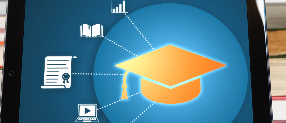 Computer screen with blue background and yellow graduation cap graphic